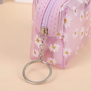 Purple translucent daisy print PVC coin purse with zipper and metal keychain