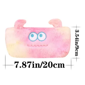 Vue détaillée des dimensions de la trousse à monstre en peluche rose et jaune