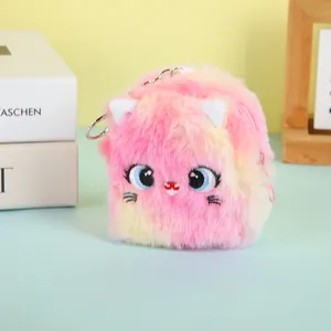 Detailed view of cat-shaped plush coin purse with embroidery and metal keychain