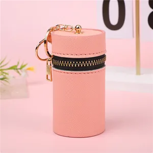 Mini pochette per rossetto in pelle rosa con zip dorata e dettaglio gancio portachiavi