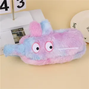Detailed view of the fluffy pink and blue gradient plush pencil case with cartoon eyes
