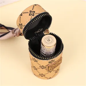 Mini floral cylinder bucket pouch for lipstick and keys with vintage patterned leather
