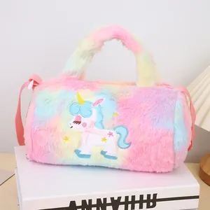 Detailed embroidery of a colorful unicorn on a soft gradient plush crossbody bag