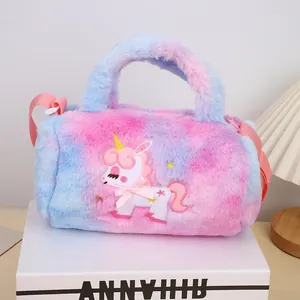 Detail of plush unicorn bag featuring pink and blue tie-dye faux fur and gold stars