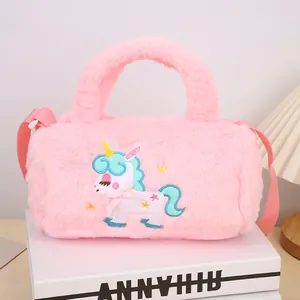 Detailed view of pink plush unicorn crossbody bag with soft faux fur and embroidery