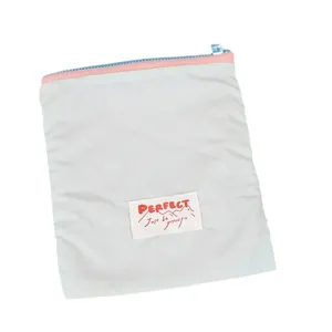 Waterproof macaron travel cosmetic bag with zipper and Perfect slogan embroidery