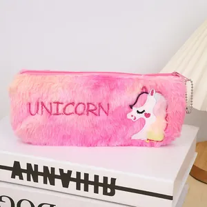Pink gradient plush unicorn pencil case with embroidery on white books background