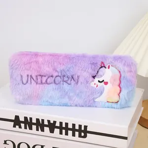 Detail of plush gradient tie-dye unicorn pencil case with soft texture and embroidery