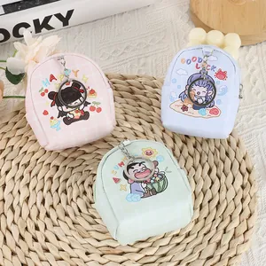 Mini backpack coin purse set in pastel colors with cartoon prints and keychains
