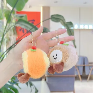 Cute strawberry plush cake charms with embroidered smiley faces and golden bead chains