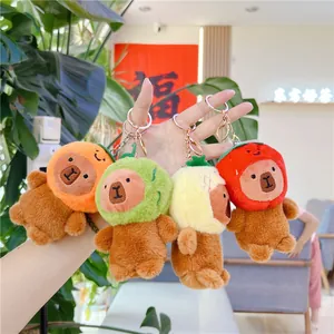 Capybara plush keychains wearing fruit hats including orange lime pineapple and strawberry