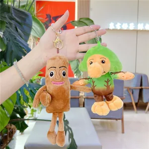 Plush keychain set with brown stick character and green-hat fantasy creature charms