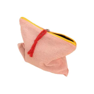 Red gingham cosmetic bag with yellow zipper and red rope puller on white background