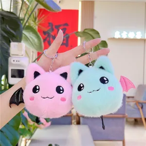 Cute plush cat bat keychain in pink and mint green with wings for bag charm