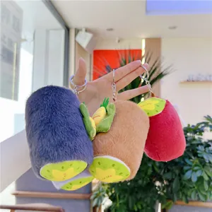 Cute plush kiwi fruit roll keychains in purple, brown and red with sleeping faces