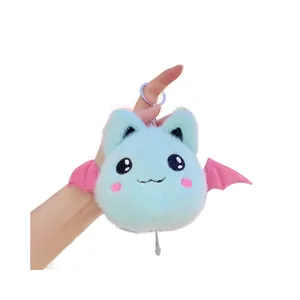 Cute plush bat keychain in light blue with pink metallic wings for backpacks and keys