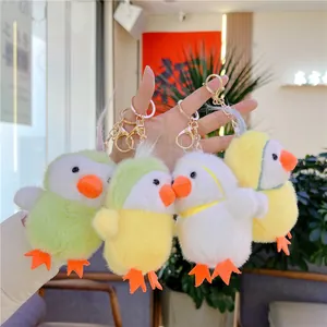 Plush bird keychain pendant in four colors with soft fur and golden metal lobster clasps