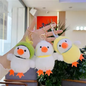 Three cute plush duck keychains with colorful headwear and golden metal rings