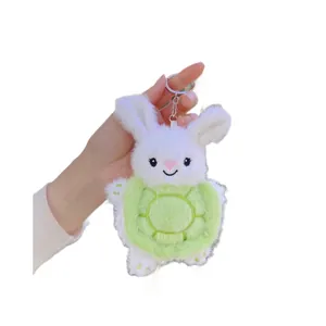 Llavero de conejo de peluche con mochila de caparazón de tortuga verde creativo