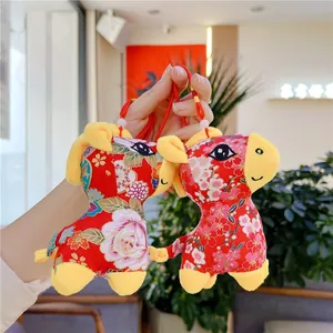 Traditional red floral plush horse charms with Chinese patterns and yellow accents