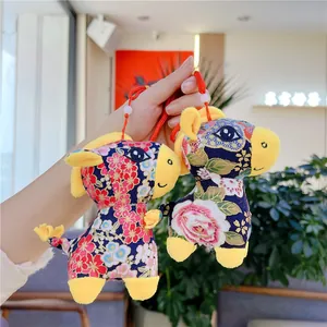 Ethnic style blue fabric horse plush pendant with floral patterns and red hanging cord