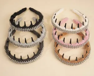 Detail showing plush headbands with sparkling rhinestones in six various colors