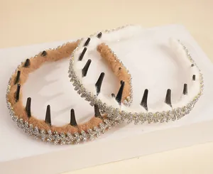 Close-up of plush rhinestone headbands with anti-slip inner teeth and sparkling crystals