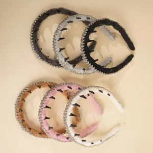 Detailed view of plush headbands with sparkling rhinestones and non-slip inner teeth