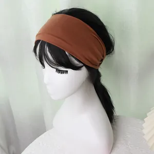 Detailed view of elastic brown yoga headband fabric texture on a mannequin