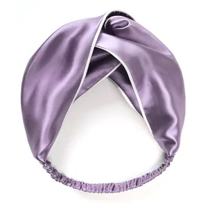 Purple twisted silk headband with white piping detail for women on white background