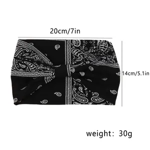 Bohemian paisley print wide headband with twist knot design measuring 20cm by 14cm