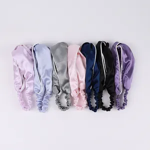 Set of seven satin silk sleep masks in assorted colors with elastic headbands