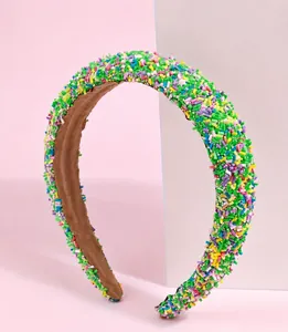 Detailed view of candy color sponge headband with colorful sprinkles and 3cm width