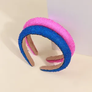 Set di cerchietti rosa barbie e blu reale con strass e texture di perline per donna
