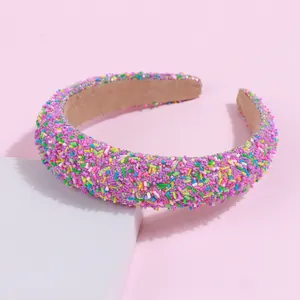 Close-up of candy-colored beaded sponge headband with textured sprinkles decoration