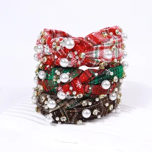 Three-piece Christmas headband set with plaid fabric, pearls, and rhinestones on white