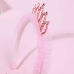 Pink princess crown headband for girls with mesh ruffles and silver glitter details