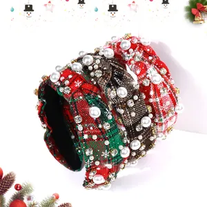 Detail of Christmas plaid headbands with pearls, rhinestones and festive snowflake charms