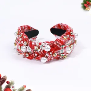 Detail of red and white tweed Christmas headband with pearls and rhinestones decoration
