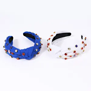 Blue and white knotted headbands with American flag charms and colorful rhinestones