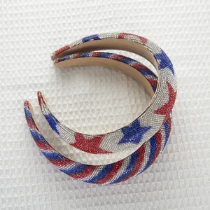 Close-up of padded headbands with red, white, and blue rhinestones in star and stripe patterns