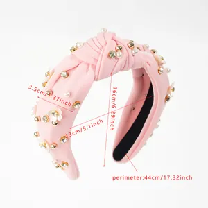 Pink knotted headband with pearls and camellia flowers showing dimensions 3.5cm wide