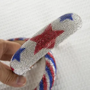 Sparkly padded headband with red, white and blue rhinestones and star patterns
