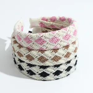 Three vintage crochet headbands with plaid patterns in pink, brown, and black colors