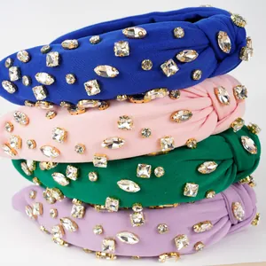 Sparkly rhinestone knotted headbands in blue, pink, green, and purple fabric