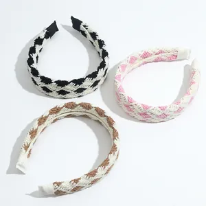 Vintage checkered crochet headbands in black, pink, and brown on a white background