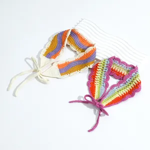 Close-up of colorful handmade crochet floral headbands with wavy patterns and ties