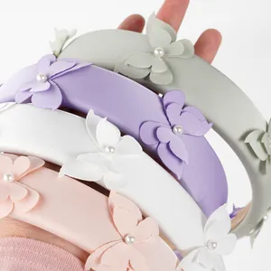Set de diademas acolchadas de esponja con mariposas de tela y perlas en tonos pastel