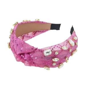 Serre-tête rose à paillettes et strass avec nœud large en tissu maille brillant