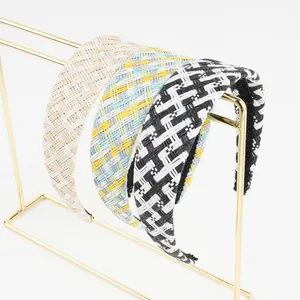Three raffia woven headbands with colorful plaid patterns and non-slip inner lining